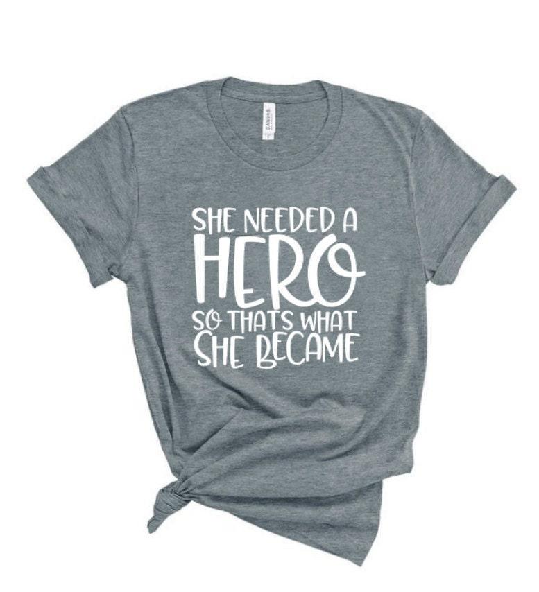 Glitter She Needed a Hero so that&#39;s what she became Shirt | Just Saying Shirt | Bella Canvas Short Sleeve | Youth or Adult